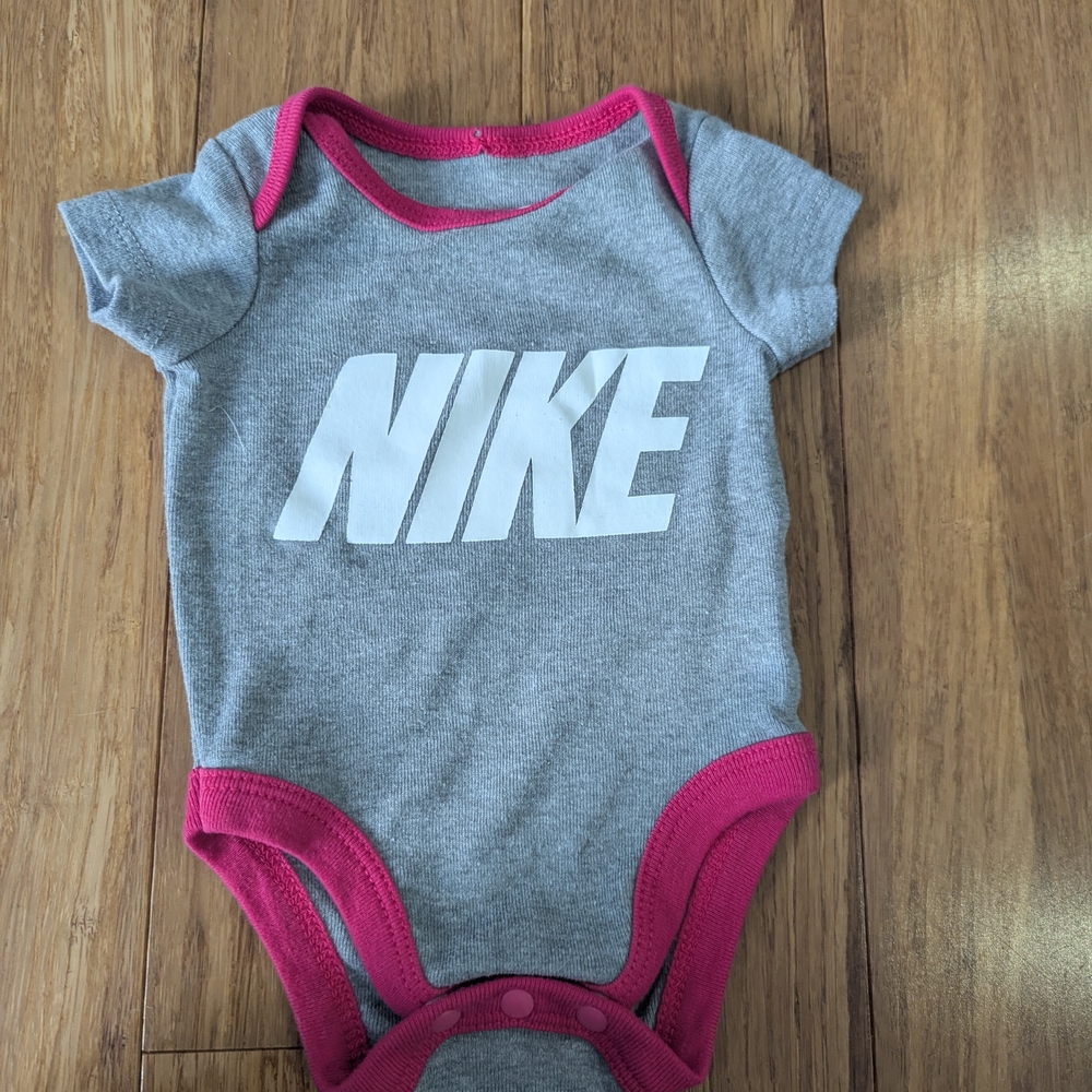 Nike Gray and Pink baby girl newborn one piece bodysuit